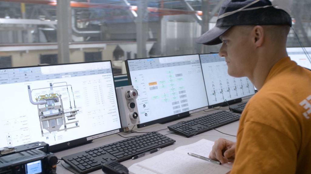 control room operator using a computer